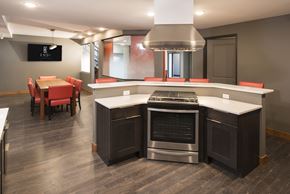 Duluth apartment for rent - A modern kitchen with a stainless steel oven and island.