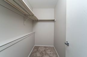Wayne apartment for rent - a walk in closet with white walls and a white door