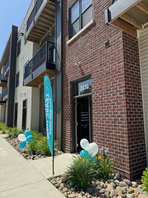 Holt apartment for rent - a brick building with balloons in front of it