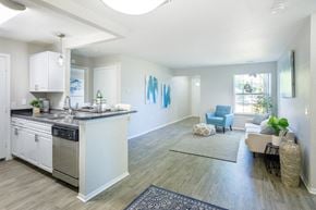 Lansing apartment for rent - a kitchen and living room with a counter top