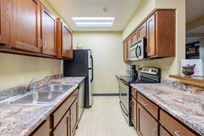 Springfield apartment for rent - a kitchen with granite counter tops and stainless steel appliances