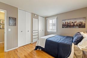Royal Oak apartment for rent - a bedroom with a bed and a window