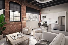 Detroit apartment for rent - Red Arrow Lofts Livingroom with exposed brick in Corktown Detroit.