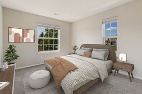 Grand Blanc apartment for rent - a bedroom with a bed and two windows