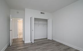Springfield apartment for rent - a bedroom with white walls and a closet with a white door