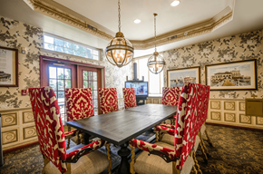 Troy apartment for rent - Formal dining room with upholstered chairs and pendant lighting at Regents Club of Troy Apartments, Troy, MI