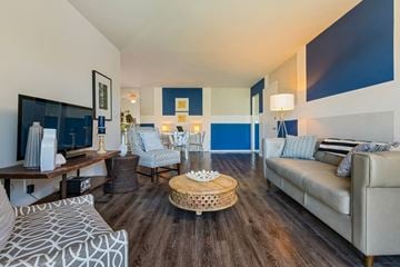 Royal Oak apartment for rent - a living room with a couch and a tv