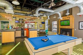Royal Oak apartment for rent - a game room with a pool table and a tv at Village Club of Royal Oak, Michigan, 48067