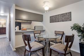 Bedford apartment for rent - A dining room with a glass table and chairs.