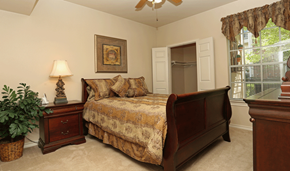 Lufkin apartment for rent - a bedroom with a bed and a window