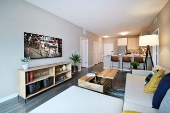 A living room with a couch and a table