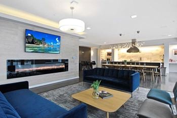 A living room filled with furniture and a flat screen tv