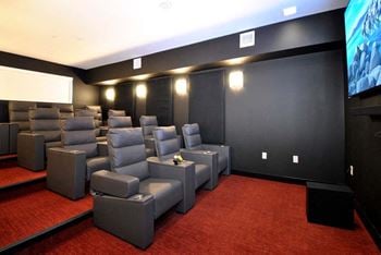 A room with a bunch of chairs in it
