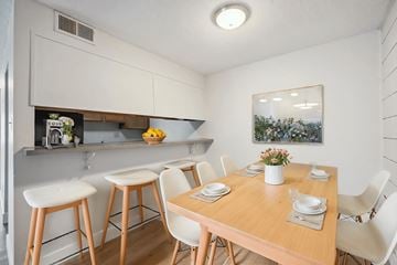 Florissant apartment for rent - A kitchen with a table and chairs.