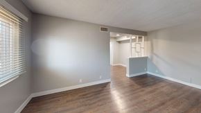 Inglewood apartment for rent - A room with wooden flooring and a white ceiling.