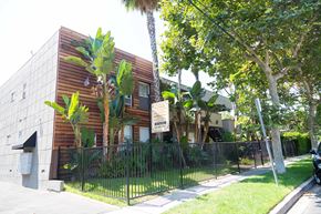 Los Angeles apartment for rent - Front of building with sidewalk and leasing signs