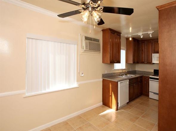 North Hollywood apartment for rent - common living area with ceiling fan and kitchen
