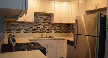Inglewood apartment for rent - a kitchen with a stove and a refrigerator