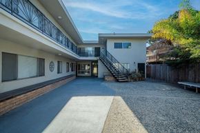 Inglewood apartment for rent - A modern house with a balcony and a staircase.