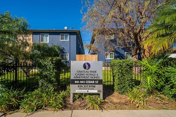 Inglewood apartment for rent - A sign for Chateau Park Casino Royale Apartments is in front of a building.