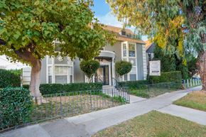 Los Angeles apartment for rent - A house with a tree in front of it.