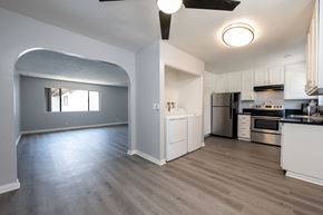 Ventura apartment for rent - A modern kitchen with a large island and stainless steel appliances.