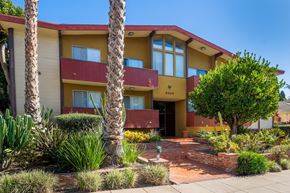 Los Angeles apartment for rent - the front of a building with palm trees