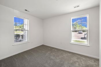 Beige carpet in bedroom