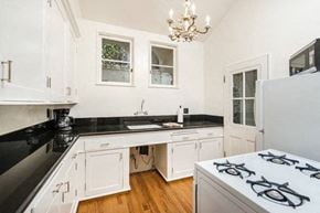 Los Angeles apartment for rent - Villa Valentino 17 Kitchen with black counters and white cabinetry