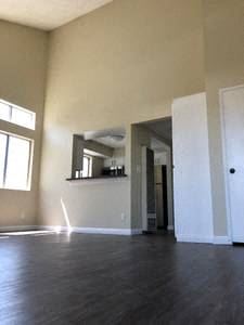 North Hollywood apartment for rent - living room with view of kitchen entrance