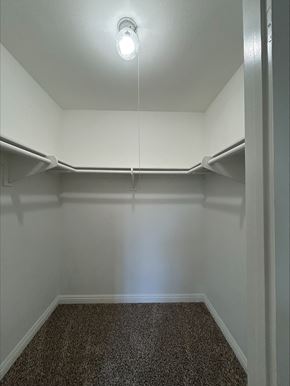 Studio City apartment for rent - A small, empty room with a single light bulb on the ceiling.