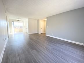 La Mesa apartment for rent - the living room and dining room of an apartment with wood flooring