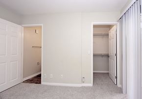 Long Beach apartment for rent - an empty bedroom with a closet and a mirrored closet door