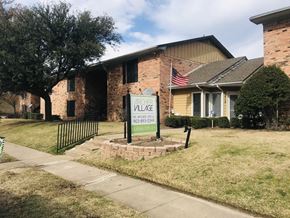 Sherman apartment for rent - a house with an flag on the front of it at Archer Village Apartments, TX, 75092