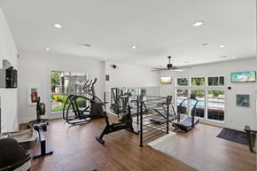 Norcross apartment for rent - A spacious gym with a variety of exercise equipment.