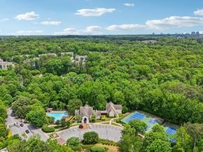 Atlanta apartment for rent - A bird's eye view of community with a swimming pool and tennis court.