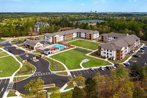Locust Grove apartment for rent - aerial view of station 75 apartments with the pool and buildings in view
