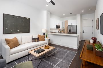 Atlanta apartment for rent - a living room with a couch and a coffee table
