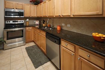 Maple-finished custom cabinets