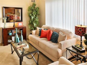 Euclid apartment for rent - a living room with a couch and a table