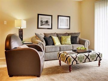 Euclid apartment for rent - a living room with a couch and a chair