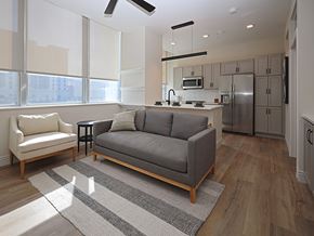 Cleveland apartment for rent - Open concept living room and kitchen area at Residences at 55 Apartments, Ohio, 44113
