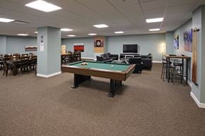 Cleveland apartment for rent - A room with a pool table and a TV.