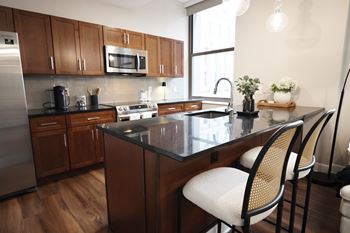 Large dine-in kitchen island (select suites)