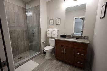 Ceramic tile floors and quartz countertops*