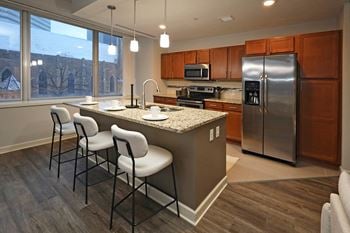 Granite countertops and porcelain tile*