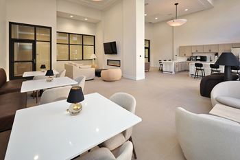 Modern community lounge with tvs & bar area
