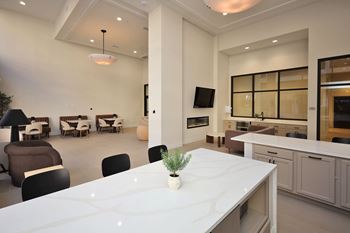 Modern community lounge with tvs & bar area