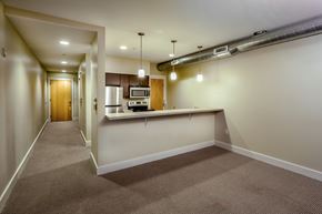 Grand Rapids townhouse for rent - A long hallway with a kitchen area at the end.