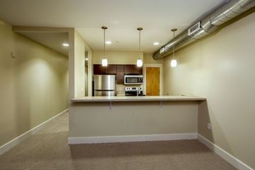 Grand Rapids townhouse for rent - A kitchen area with a counter and a stove.